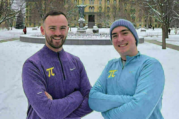 David Carr, an ESTEEM graduate student, left, and Chris Fakhimi, a computer science graduate student, right.